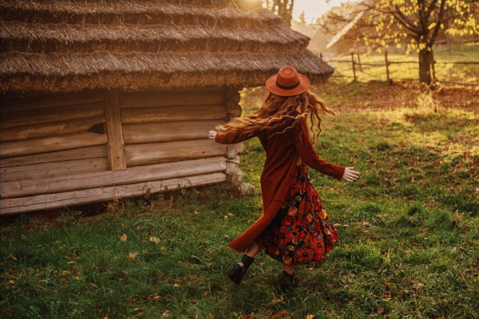 Rear,,Back,View,Of,Young,Redhead,Woman,With,Long,Natural